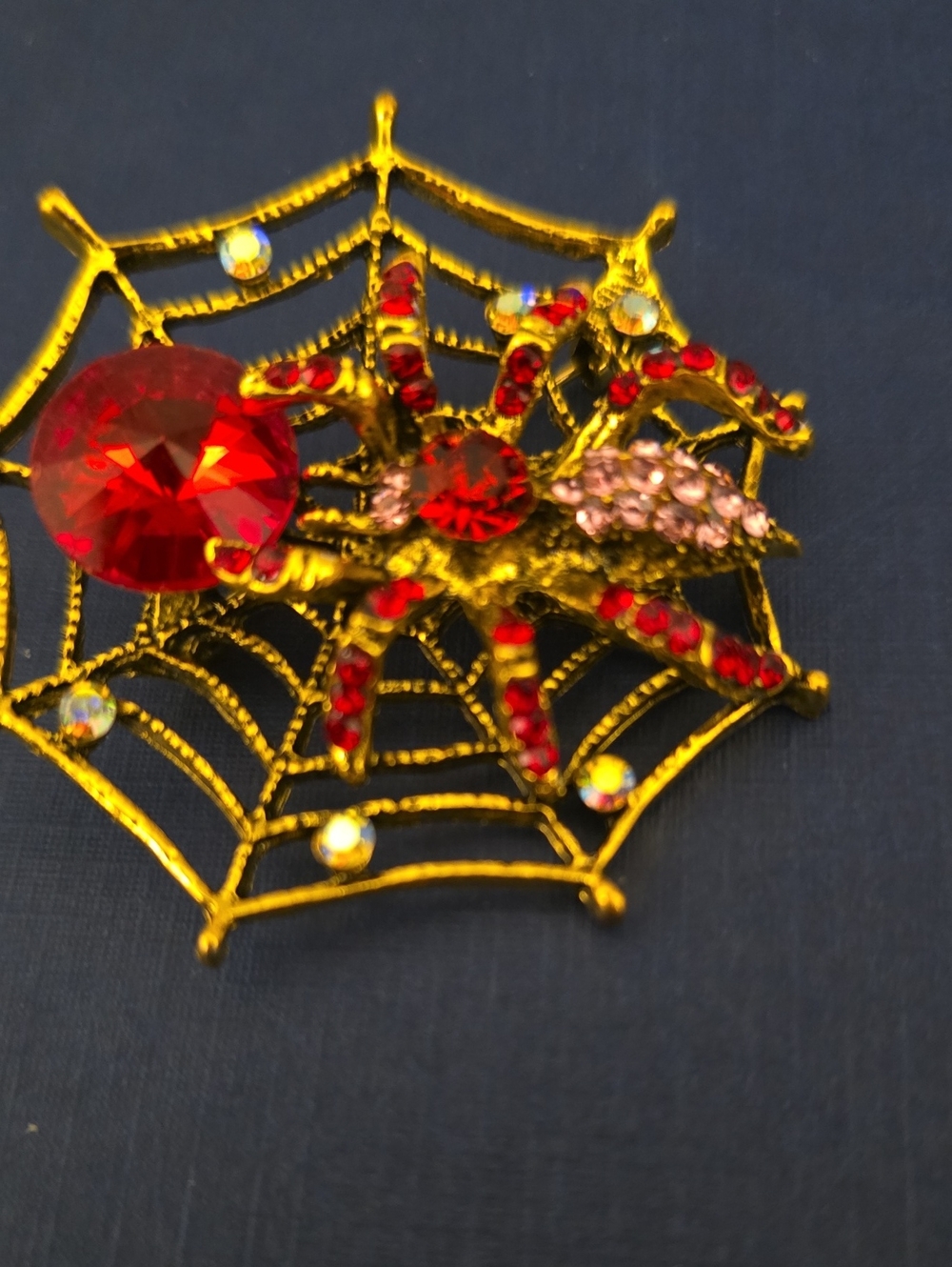 Gold Spider Web Brooch with Red and Pink Crystals